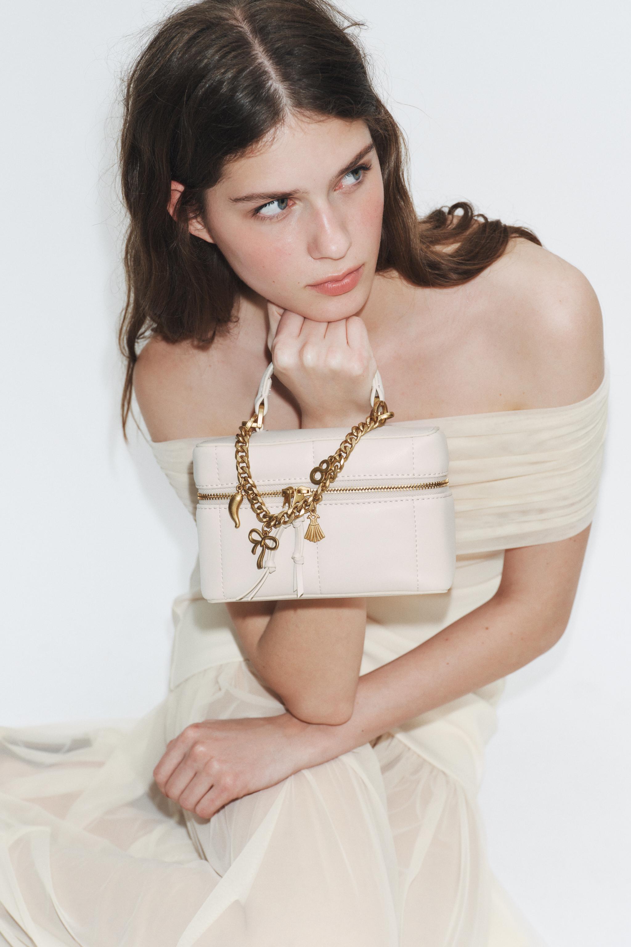 VANITY BAG WITH CHARMS